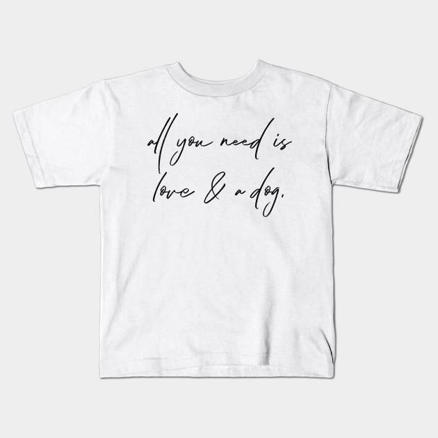 All you need is love & a dog. Kids T-Shirt by Kobi